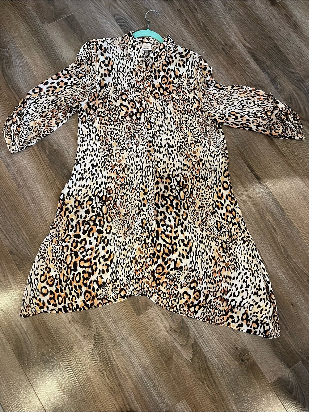 Cupio leopard print longline button-front shirt/duster in size Medium.